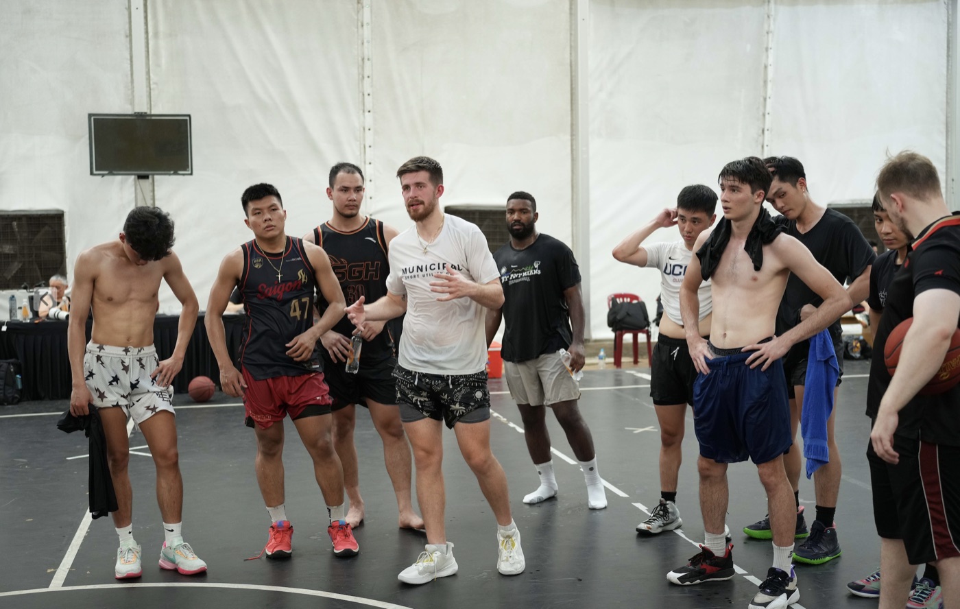 Coleman Ayers running a coaching session abroad